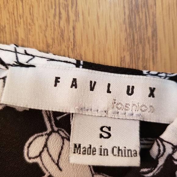 Sexy black and silver floral halter top. Open back, one button close. EUC - Picture 8 of 9